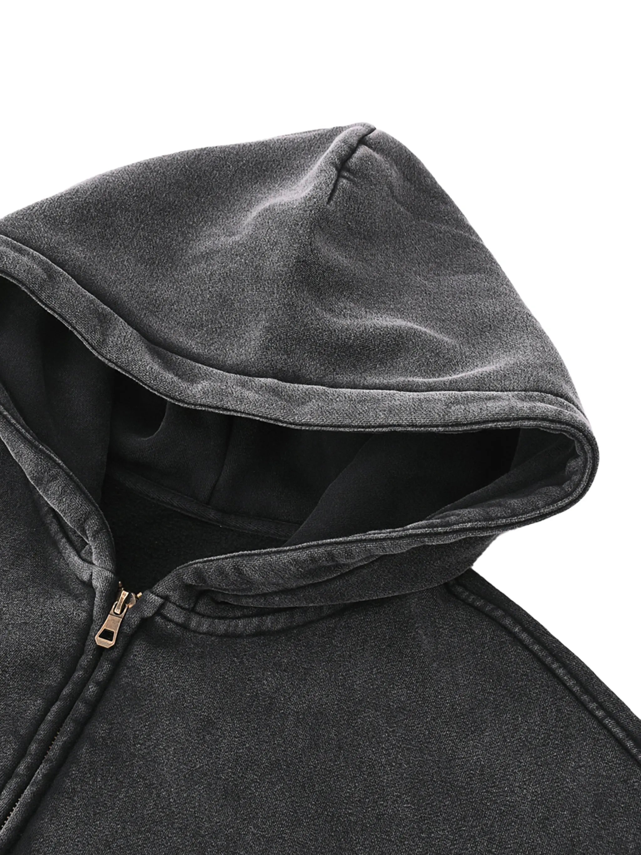 Close-up of a dark gray hoodie with a zipper on a white background